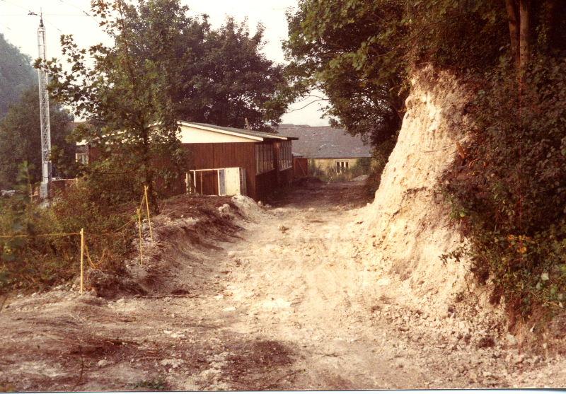 construction10.jpg - Amberley Station takes shape. The radio exhibition - a pair of old temporary school rooms - is already built and the cliff cut away ready for the track to be laid. The photo was taken from roughly where the Nature Trail now crosses the line.
